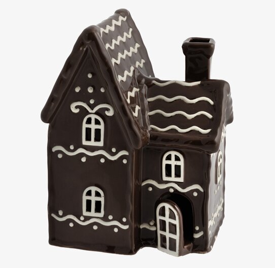 Bild av charmig ljuslykta formad som pepparkakshus