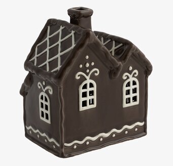 Bild av dekorativ ljuslykta i pepparkakshusdesign