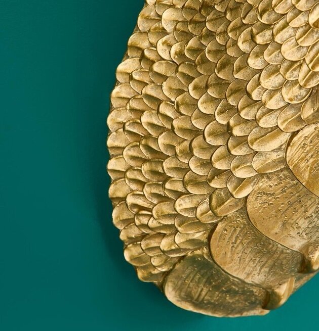 Vägglampa Dragon Gold från Werner Voss på smaragdgrön vägg