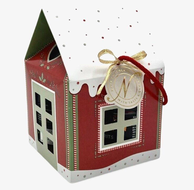 Julhuset från Narr Chocolate med dekorerat tak och fönster