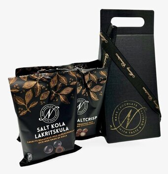 Bild av elegant julkasse med lyxiga chokladprodukter