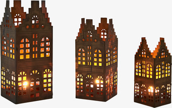 Foto av stilfulla ljushållare i rost och mässing