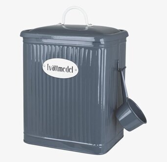 Foto av retroinspirerad blå plåtburk för tvättmedel