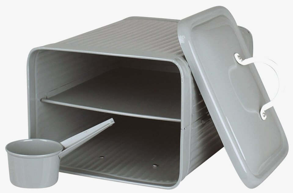 Bild av grön plåtburk med lock och skopa för tvättmedel