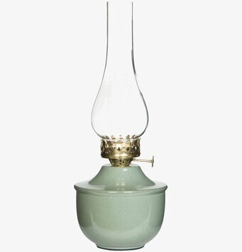 Bild av ljuslykta med grön emalj och gyllene detaljer