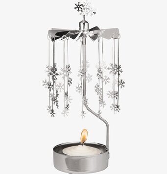 Bild av elegant änglaspel med snöflingor i rörelse