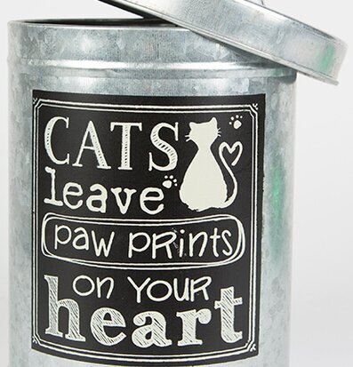 Bild av stilren plåtburk med kattmotiv för heminredning