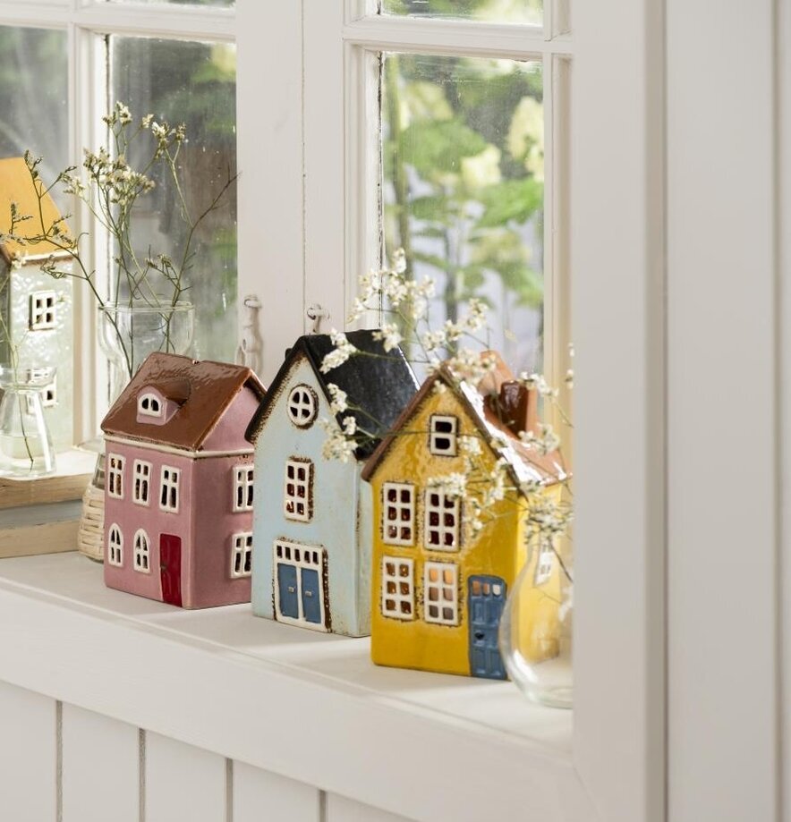 Ljuslykta Nyhavn Gul från IB Laursen på en vit fönsterbräda