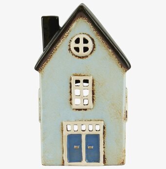 Bild av ljuslykta formad som ett charmigt litet hus