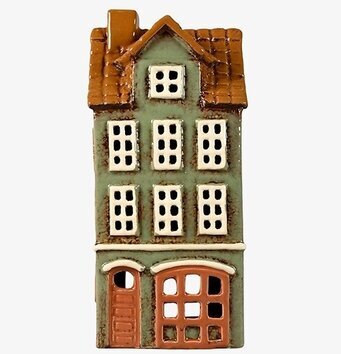 Bild av dekorativ ljuslykta som stiliserat hus