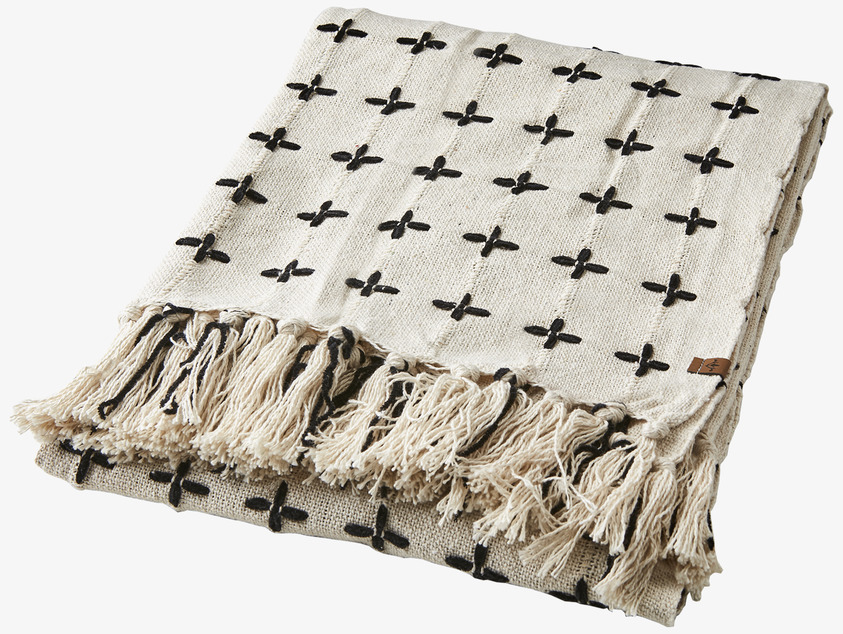 Filt Maja Elfenben/Svart från Affari med svart korsmönster