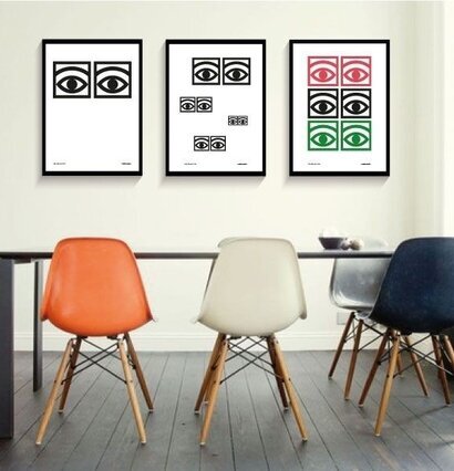 Ögon Svart/Vit av Olle Eksell på en modern kontorsvägg