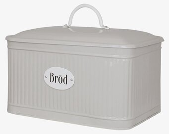 Foto av beige plåtburk för brödförvaring i köket