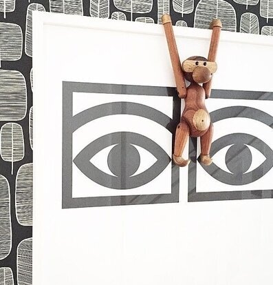 Affisch Ögon Cacao Svart av Olle Eksell på svartvit tapet