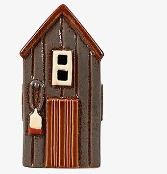 Bild av charmig ljuslykta med kustnära design