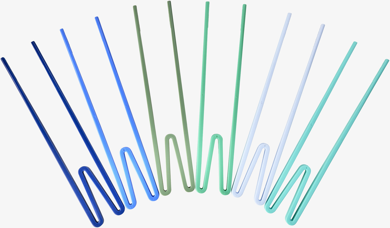 Ätpinnar Blå/Grön från Rice arrangerade i bågformation