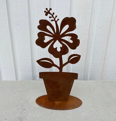 Hibiskus på fot Rost från Lind Decoration mot vit träpanel