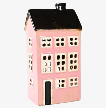 Foto av en stilfull ljuslykta formad som ett hus