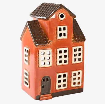 Bild av ljuslykta i form av ett traditionellt hus