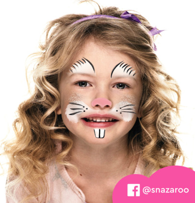 Bild av barn med kaninansikte och livfull ansiktsfärg