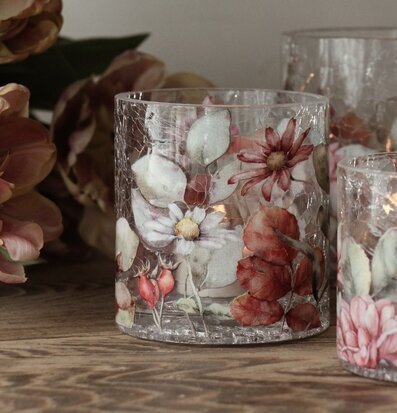 Bild av stilfull ljuslykta med blomsterillustrationer
