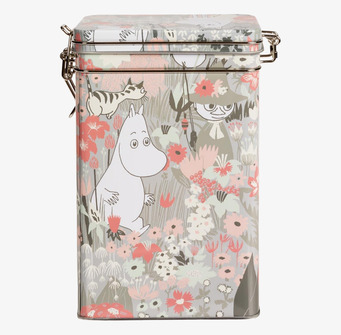 Bild av kaffeburk med Muminmotiv och blommor