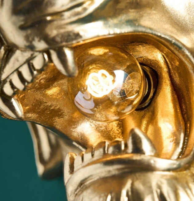 Vägglampa King Lion från Werner Voss i gyllene färg