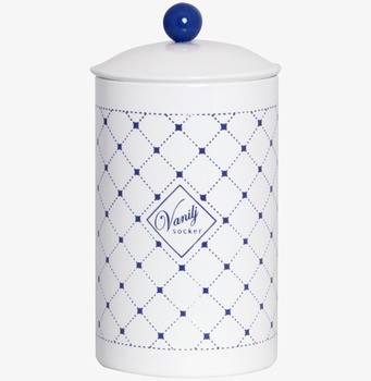 Bild av vit plåtburk med blått mönster och vintage stil