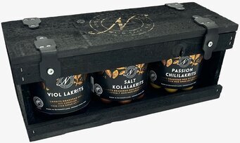 Bild av elegant presentlåda med lyxig lakritsdesign