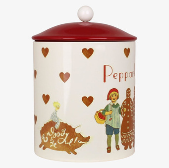 Bild av nostalgisk plåtburk med julmotiv och pepparkakor