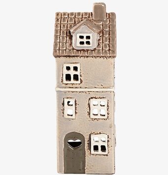 Foto av charmig ljuslykta i form av ett hus