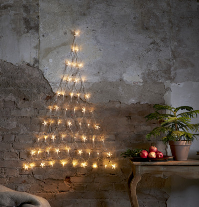 Ljusnät Star Curtain från Star Trading på rustik betongvägg