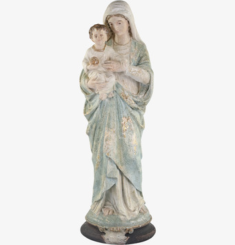 Bild av detaljrik madonnaskulptur med antik charm