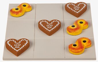 Bild av julinspirerat tre-i-rad-spel med lussekatter