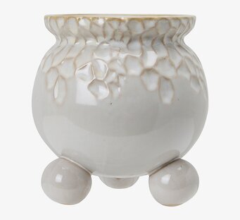 Bild av keramikkruka med unik design och reliefmönster