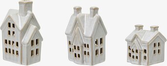 Bild av tre dekorativa keramikhus med LED-belysning
