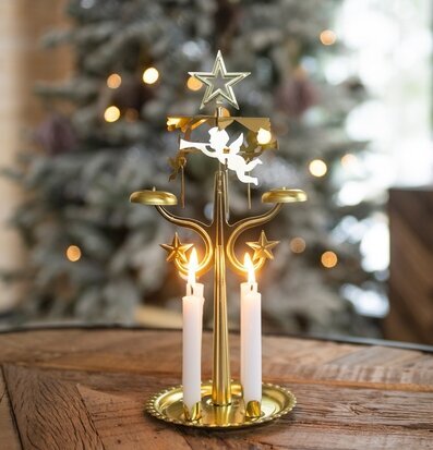 Bild av harmoniskt änglaspel i mässing och träbord