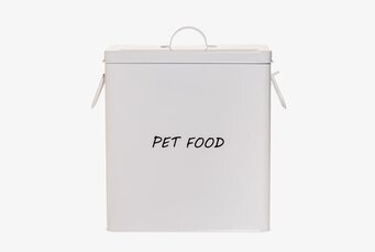 Bild av stilren vit plåtburk för djurmatförvaring