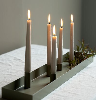 Foto av modern grön ljusstake med magnetiska hållare