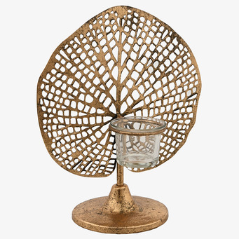 Bild av elegant ljushållare i guld med naturinspirerad design