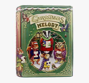 Bild av julig plåtburk med djurmotiv och bokdesign