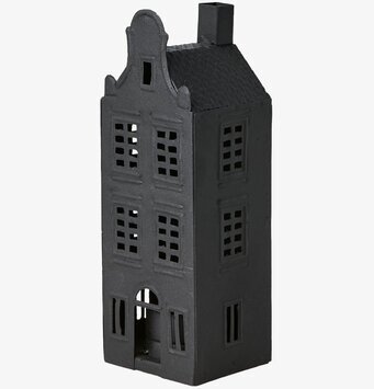 Bild av charmant ljuslykta formad som ett svart hus