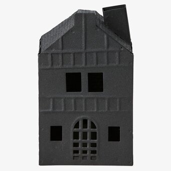 Bild av en elegant ljuslykta formad som ett charmigt hus