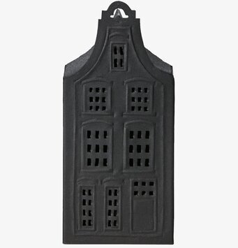 Bild av dekorativ ljuslykta som skapar varm atmosfär