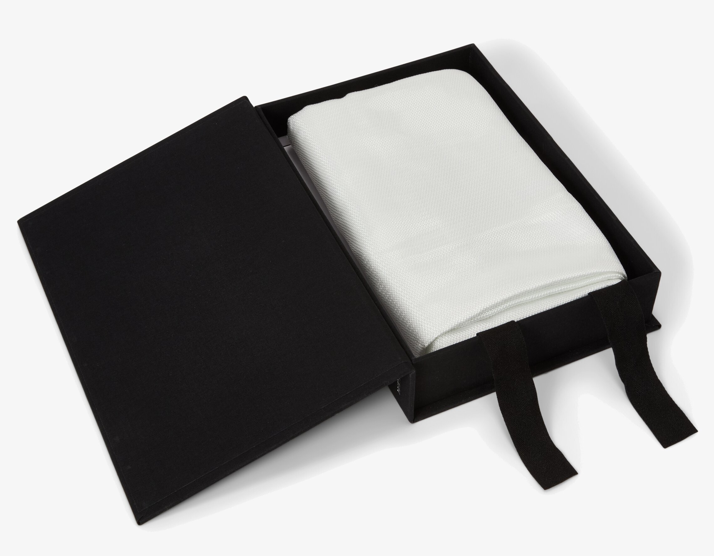 Bild av stilren brandfilt i elegant svart förpackning