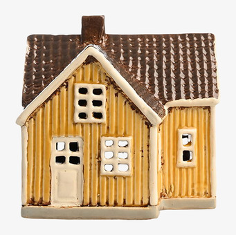 Foto av ljuslykta i form av ett charmigt litet hus