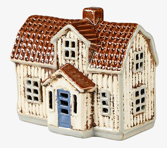 Foto av charmig ljuslykta formad som ett hus