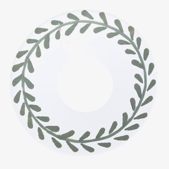 Bild av stilfull ljusmanschett med bladmotiv och harmoni