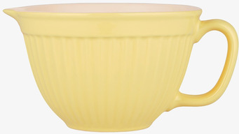Foto av vispskål i ljusgul keramik med elegant design