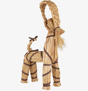 Bild av traditionell julbock i halm med bruna band